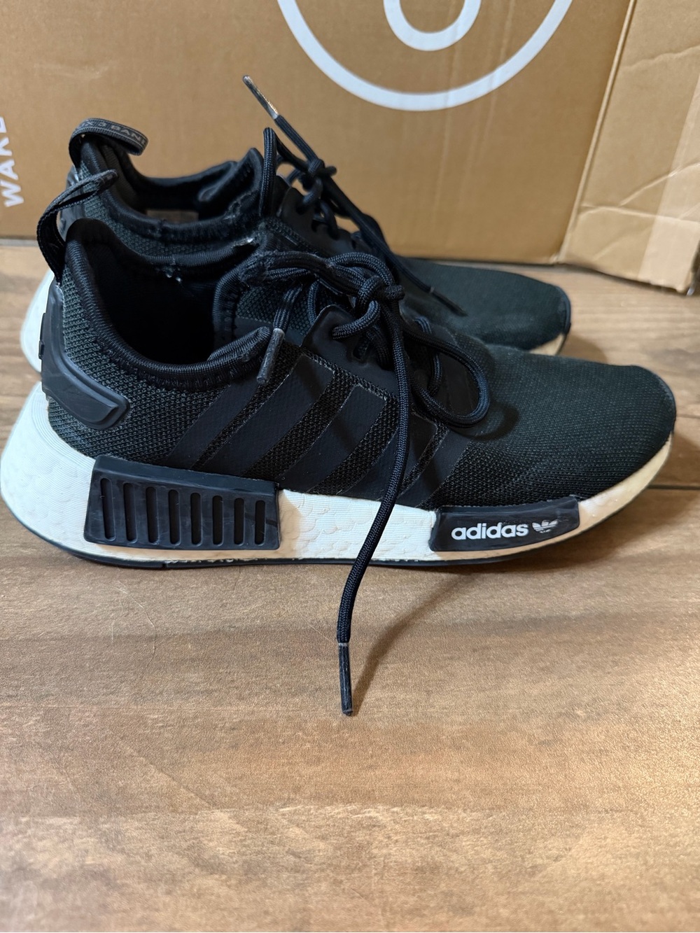 adidas Black and White Men’s NMD R1 Lifestyle Sneakers